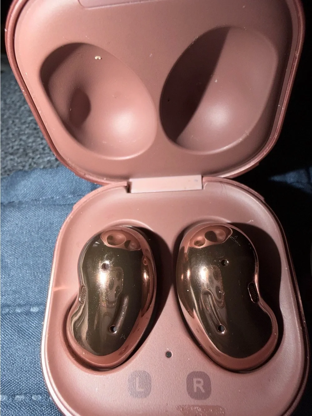 Samsung Earbuds with Charging Case in Rose Copper and Carrying case included.